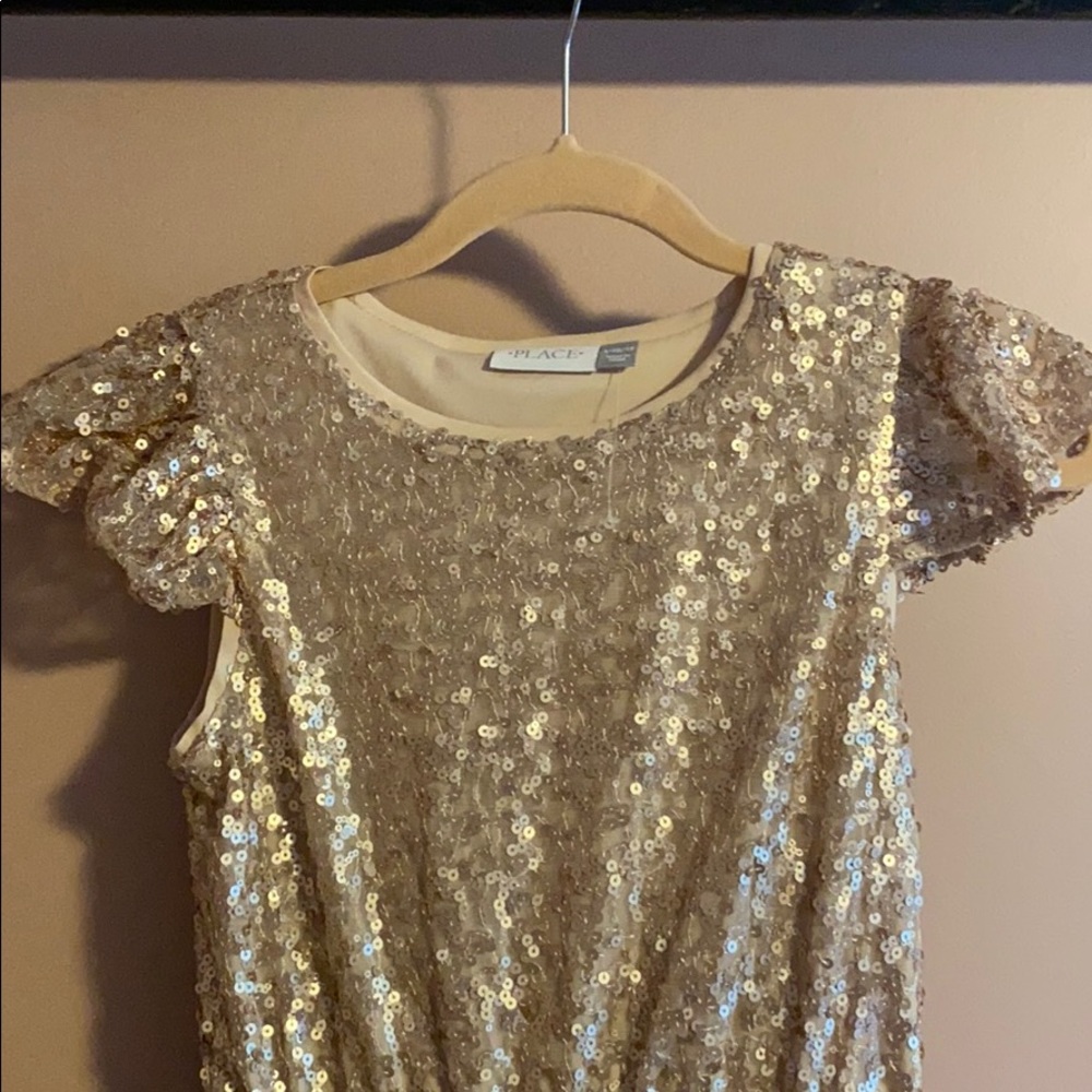 A beautiful sequins girls dress.